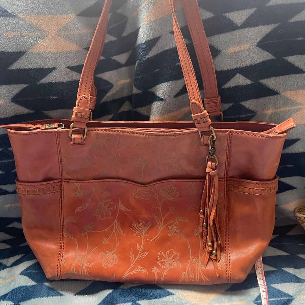 The Sak- Bohemian Tan Leather Floral Embossed Tote Bag with Tassel
